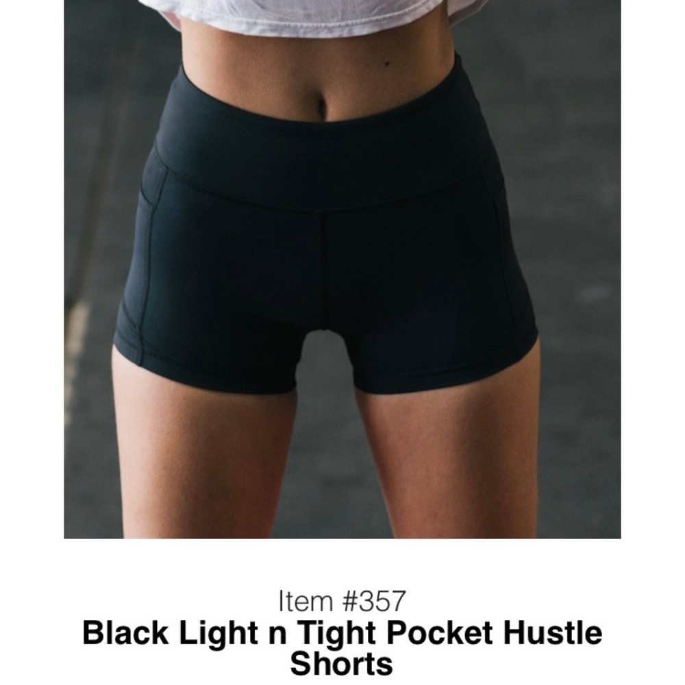 Zyia black light n tight pocket hustle shorts. Size M
